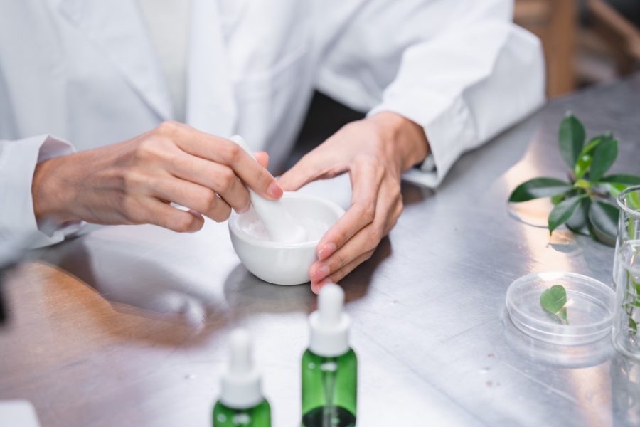 chemistry scientist working on biotechnology cosmetic research with natural herb medicine ingredient in biology science laboratory, organic bio eco beauty extract in botany experiment for dermatology